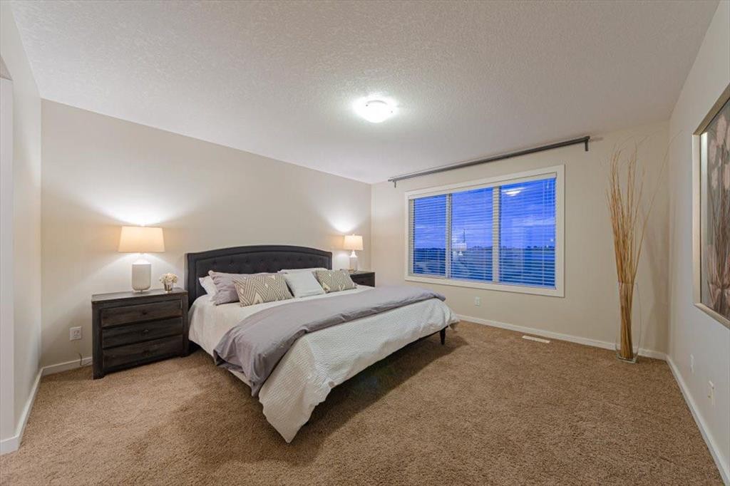 138 Copperpond Street Se, Calgary, AB - Indoor Photo Showing Bedroom