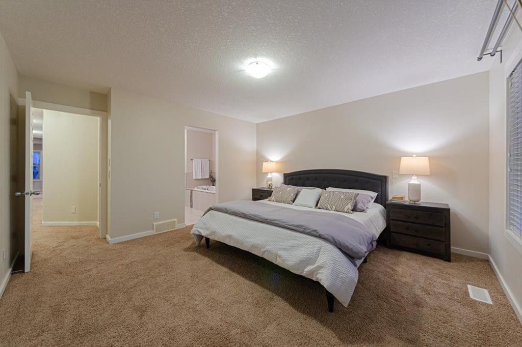 138 Copperpond Street Se, Calgary, AB - Indoor Photo Showing Bedroom