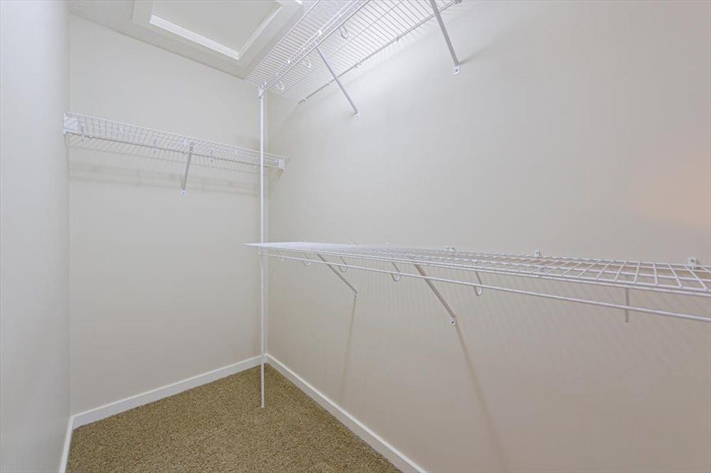 138 Copperpond Street Se, Calgary, AB - Indoor With Storage
