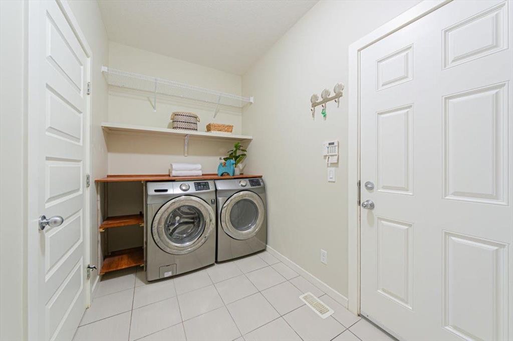138 Copperpond Street Se, Calgary, AB - Indoor Photo Showing Laundry Room