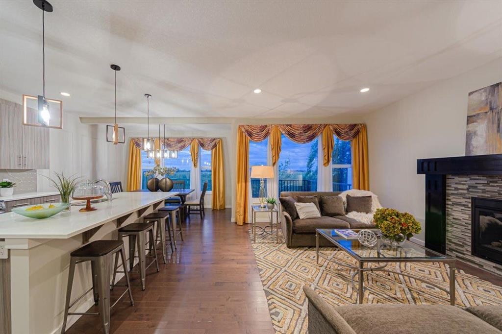 138 Copperpond Street Se, Calgary, AB - Indoor Photo Showing Living Room With Fireplace