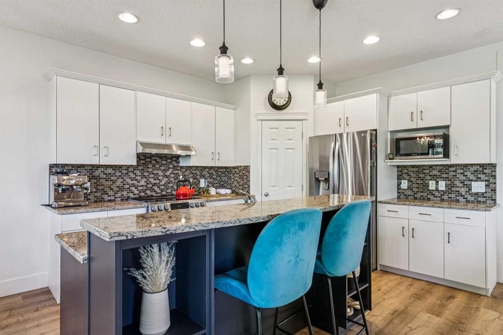 135 Tuscany Ravine Road Nw, Calgary, AB - Indoor Photo Showing Kitchen With Stainless Steel Kitchen With Upgraded Kitchen