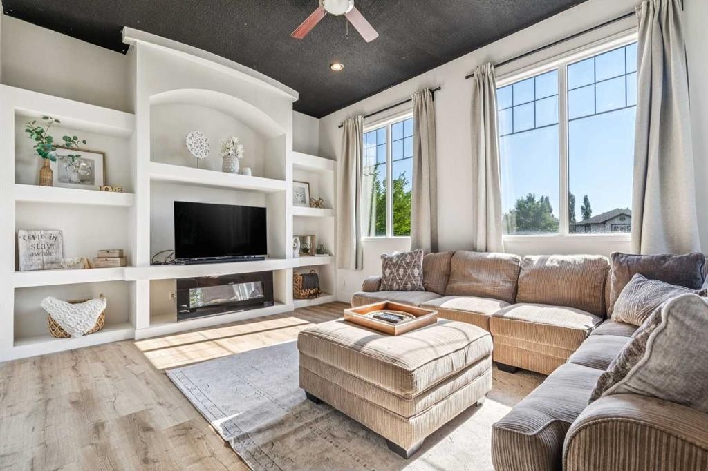 135 Tuscany Ravine Road Nw, Calgary, AB - Indoor Photo Showing Living Room