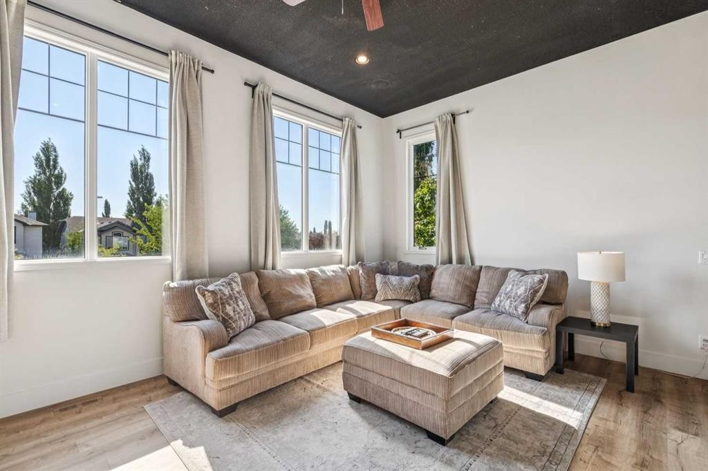 135 Tuscany Ravine Road Nw, Calgary, AB - Indoor Photo Showing Living Room
