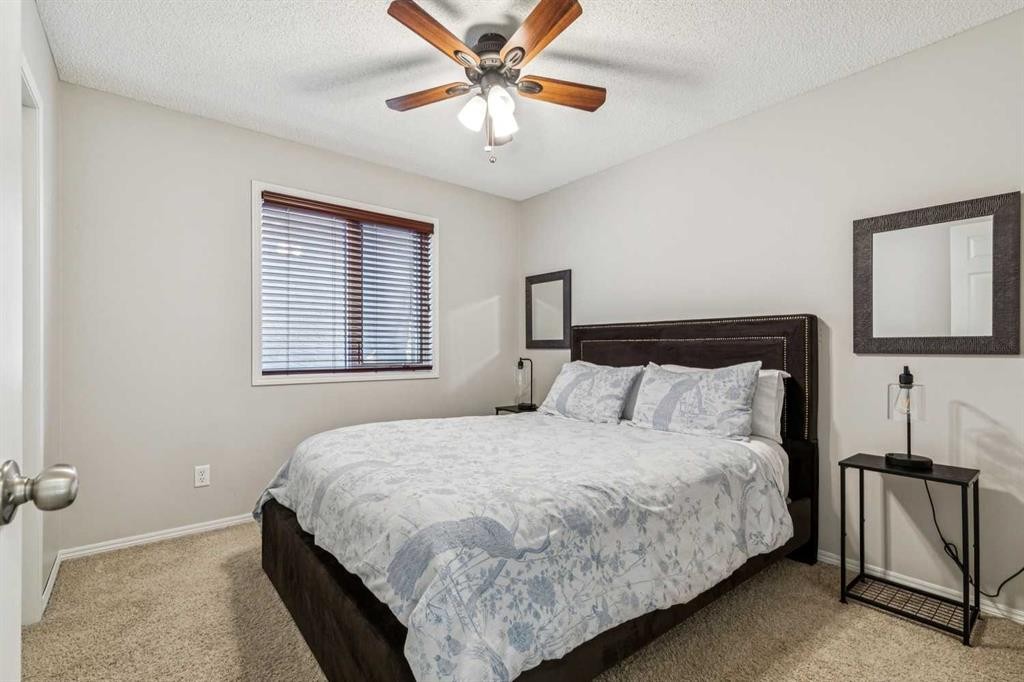 135 Tuscany Ravine Road Nw, Calgary, AB - Indoor Photo Showing Bedroom