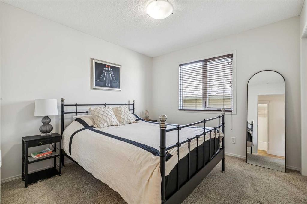 135 Tuscany Ravine Road Nw, Calgary, AB - Indoor Photo Showing Bedroom