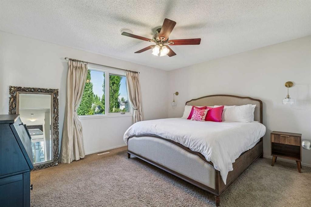 135 Tuscany Ravine Road Nw, Calgary, AB - Indoor Photo Showing Bedroom