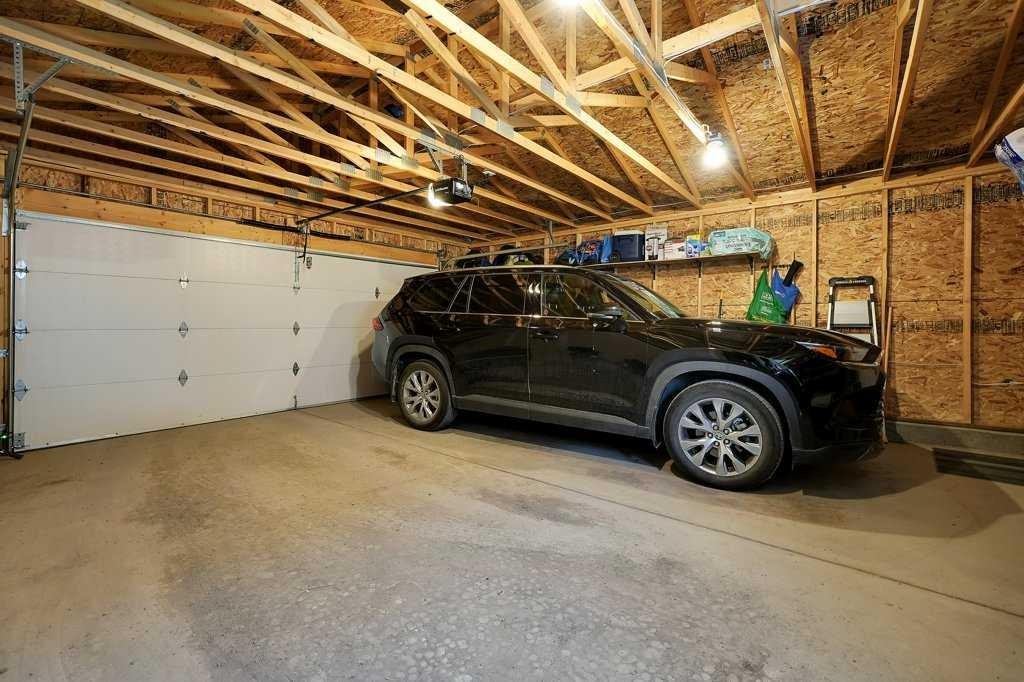 244 Belmont Boulevard Sw, Calgary, AB - Indoor Photo Showing Garage