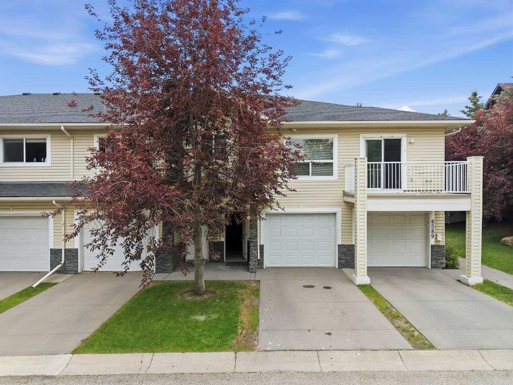 6591 Pinecliff Grove Ne, Calgary, AB - Outdoor With Balcony With Facade