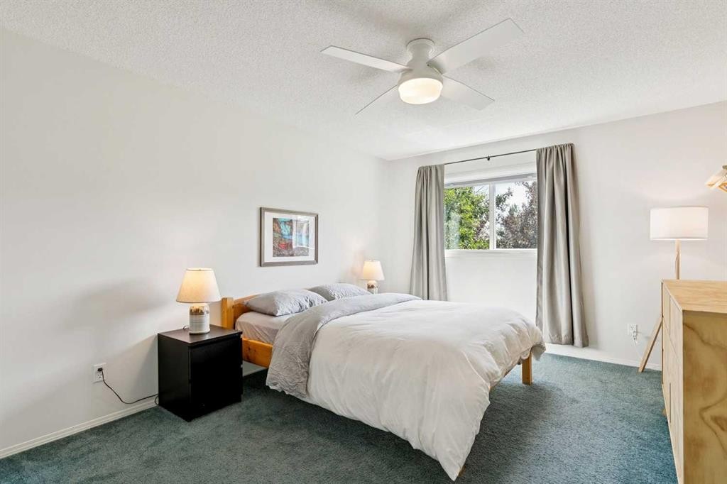 98 River Rock Way Se, Calgary, AB - Indoor Photo Showing Bedroom