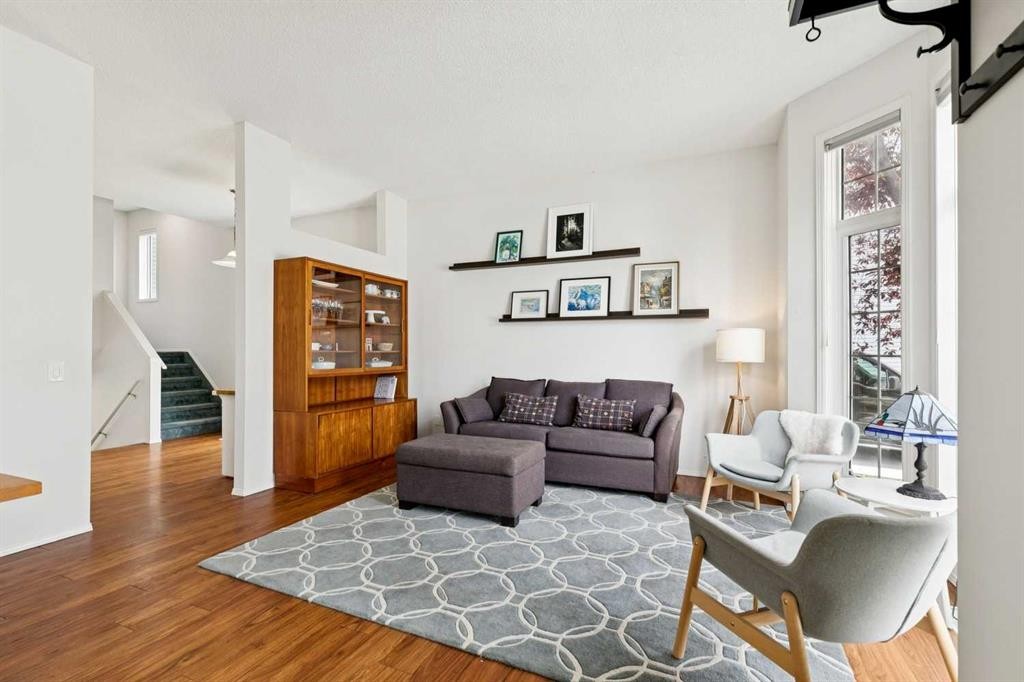 98 River Rock Way Se, Calgary, AB - Indoor Photo Showing Living Room
