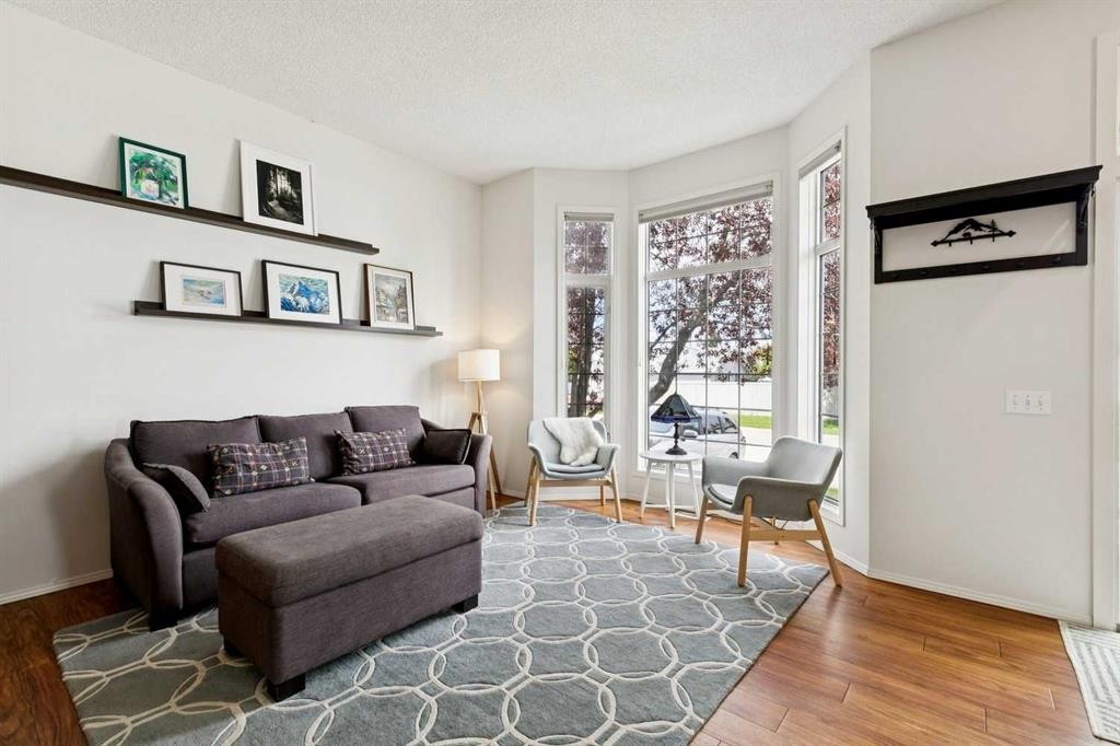 98 River Rock Way Se, Calgary, AB - Indoor Photo Showing Living Room