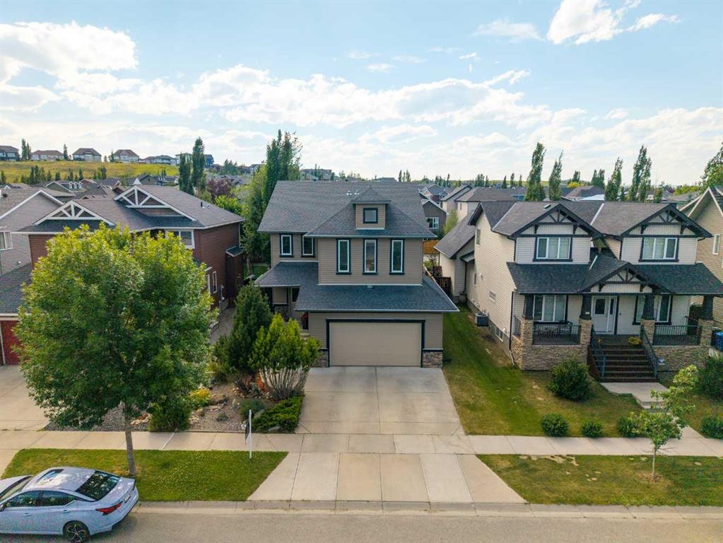 22 Westfall Drive, Okotoks, AB - Outdoor With Facade