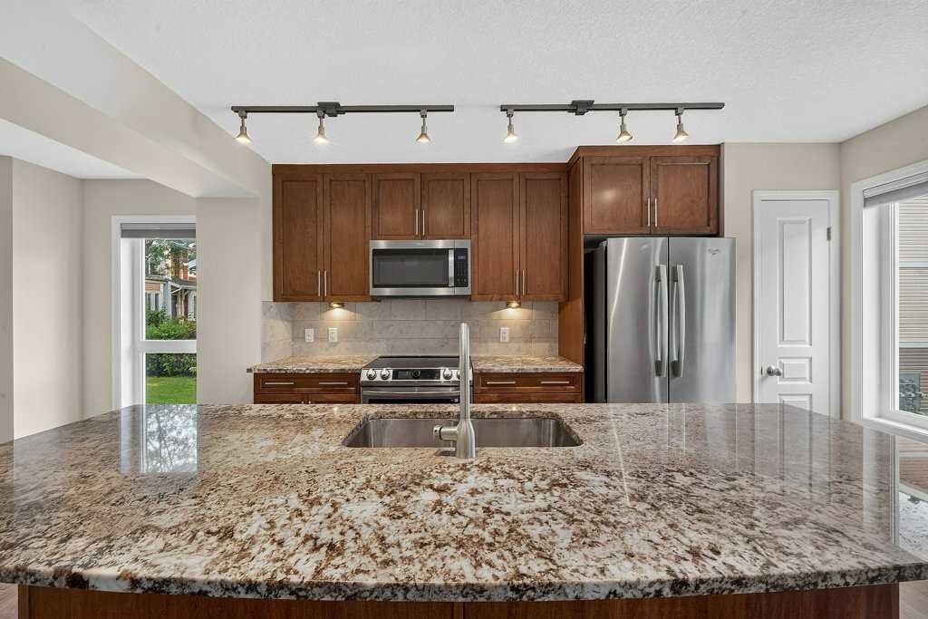 721 Auburn Bay Square Se, Calgary, AB - Indoor Photo Showing Kitchen With Stainless Steel Kitchen With Double Sink With Upgraded Kitchen