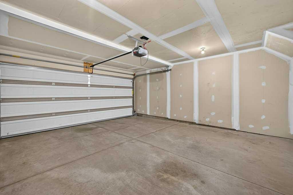 721 Auburn Bay Square Se, Calgary, AB - Indoor Photo Showing Garage