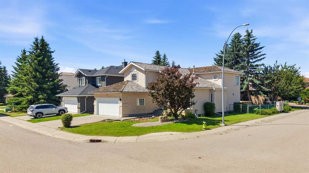 71 Woodpark Close Sw, Calgary, AB - Outdoor With Facade