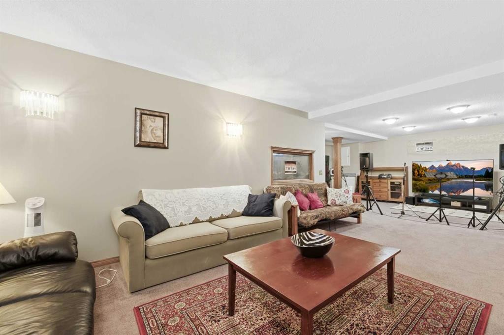 71 Woodpark Close Sw, Calgary, AB - Indoor Photo Showing Living Room