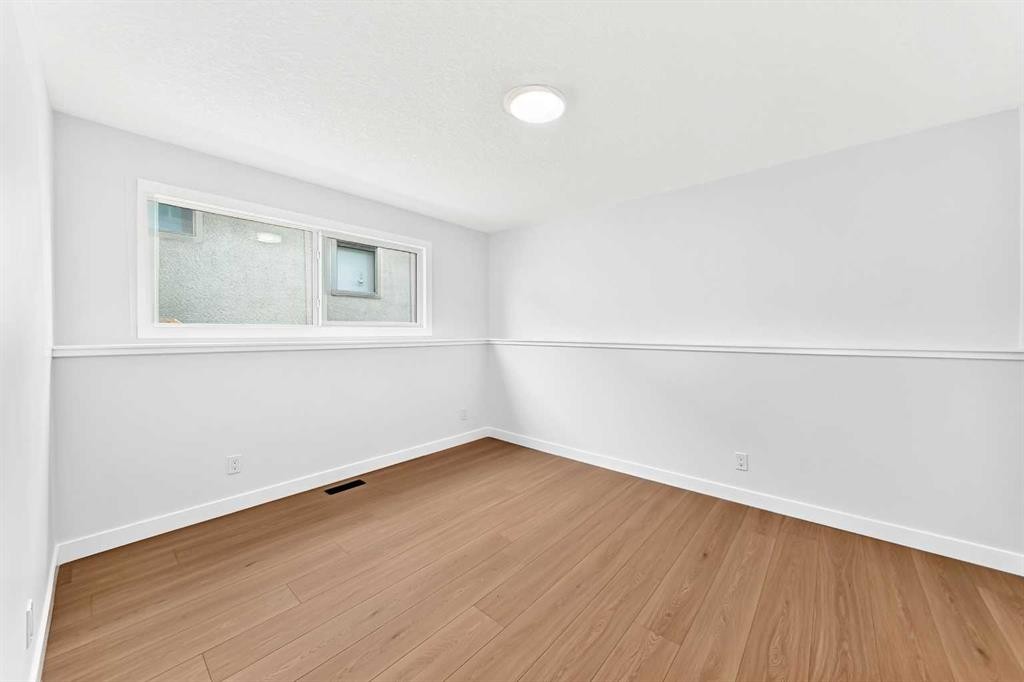 1204 Lake Sylvan Drive Se, Calgary, AB - Indoor Photo Showing Other Room