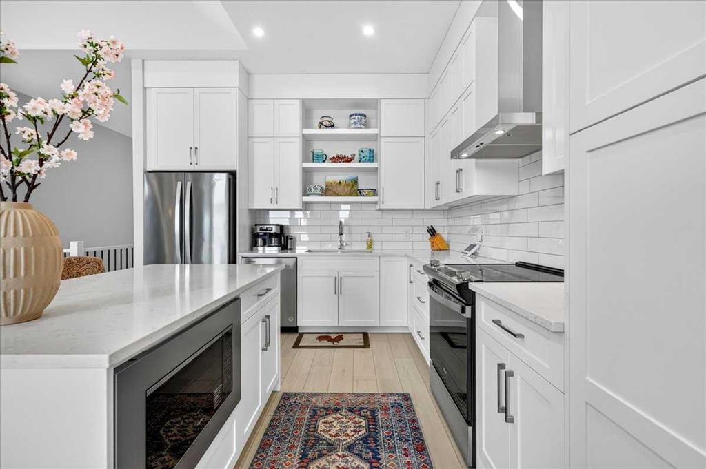1066 Creekside Boulevard Sw, Calgary, AB - Indoor Photo Showing Kitchen With Stainless Steel Kitchen With Upgraded Kitchen