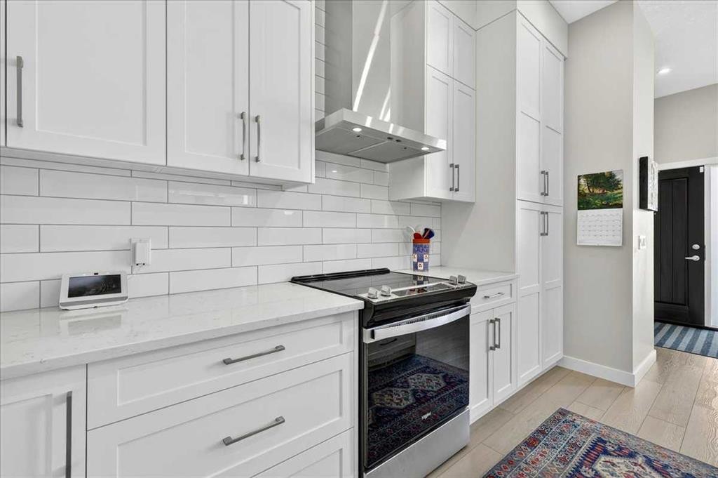 1066 Creekside Boulevard Sw, Calgary, AB - Indoor Photo Showing Kitchen With Upgraded Kitchen