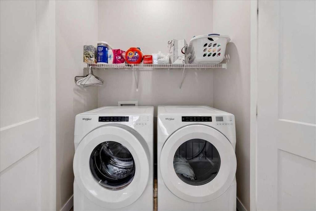 1066 Creekside Boulevard Sw, Calgary, AB - Indoor Photo Showing Laundry Room