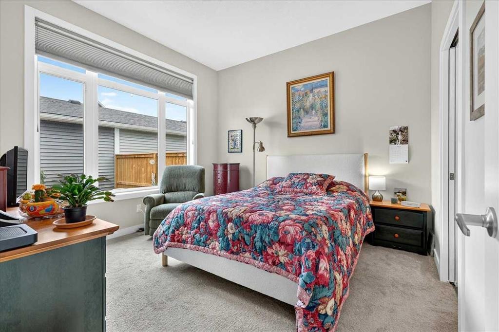 1066 Creekside Boulevard Sw, Calgary, AB - Indoor Photo Showing Bedroom