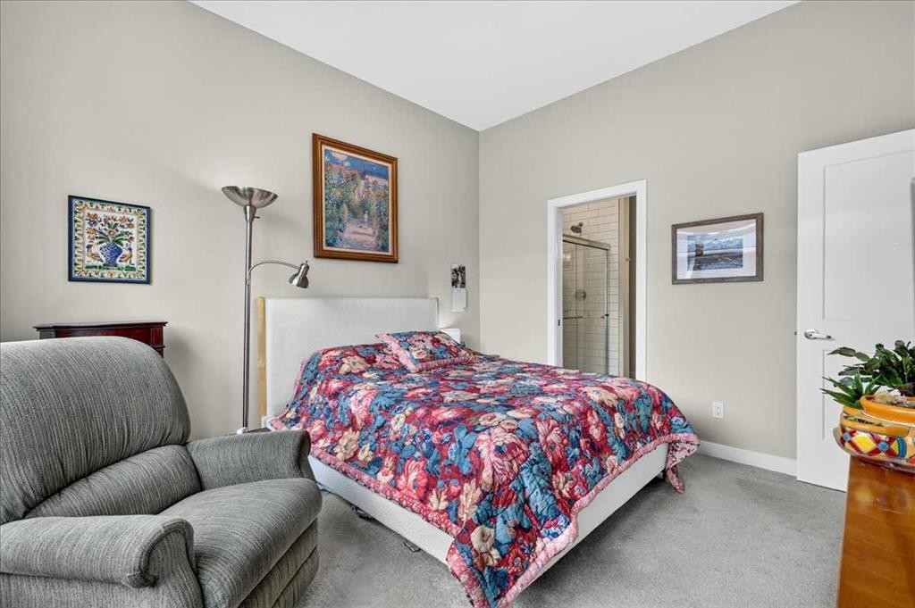 1066 Creekside Boulevard Sw, Calgary, AB - Indoor Photo Showing Bedroom