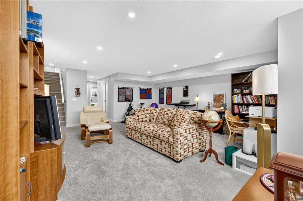 1066 Creekside Boulevard Sw, Calgary, AB - Indoor Photo Showing Bedroom