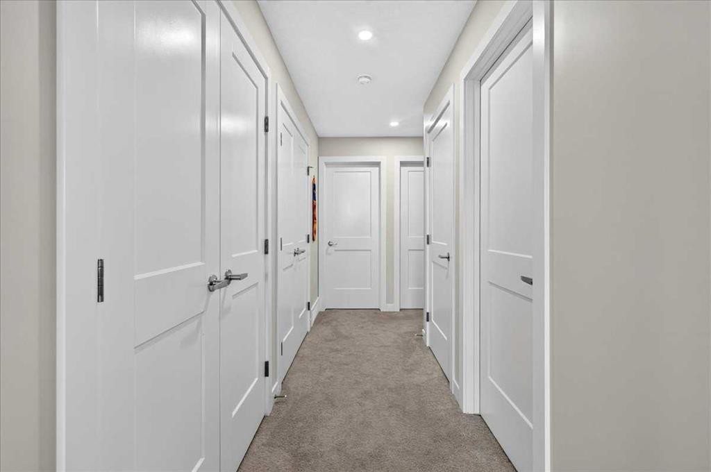 1066 Creekside Boulevard Sw, Calgary, AB - Indoor Photo Showing Other Room