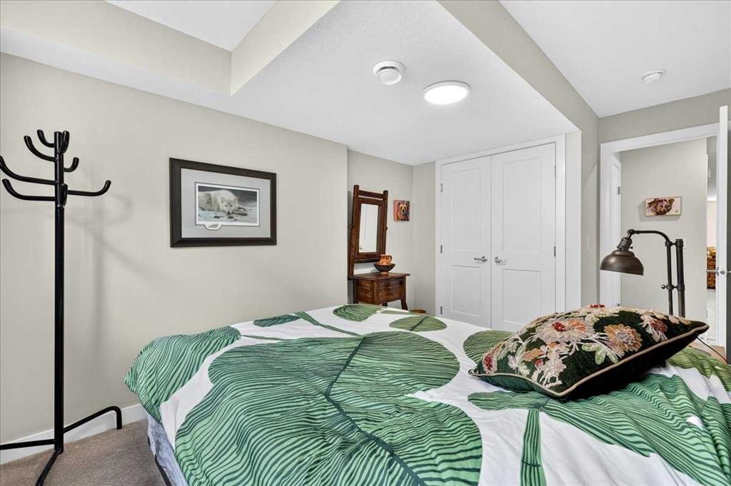1066 Creekside Boulevard Sw, Calgary, AB - Indoor Photo Showing Bedroom