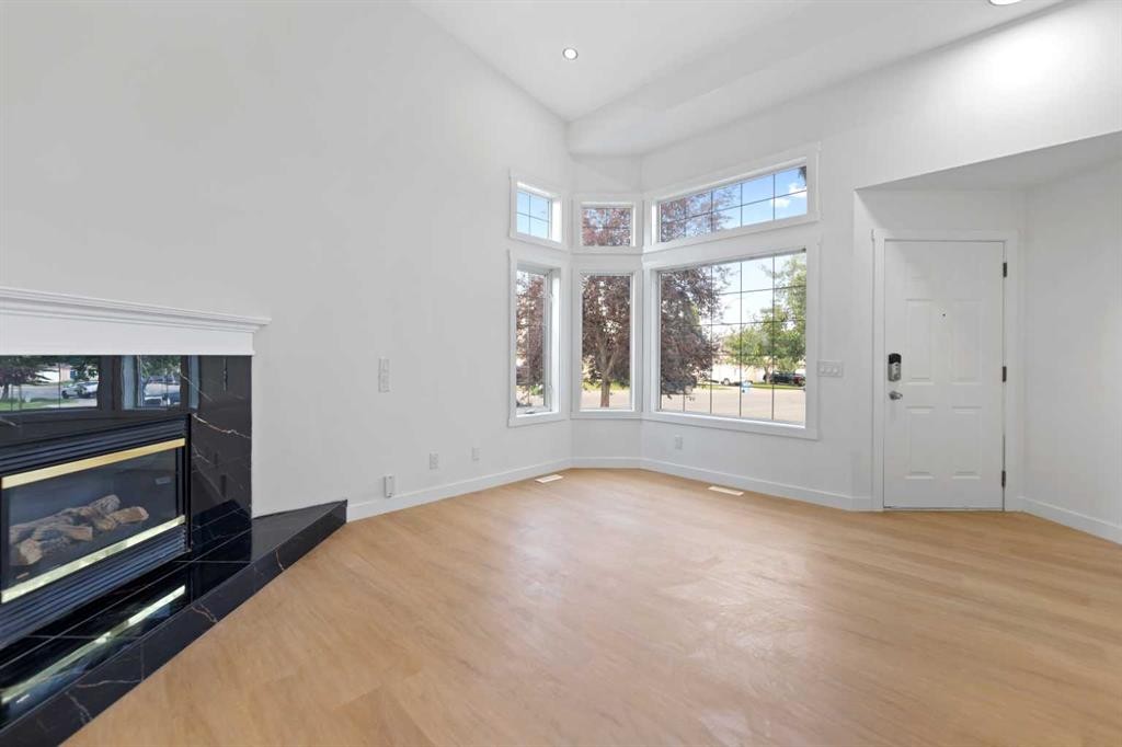 434 Harvest Grove Place Ne, Calgary, AB - Indoor With Fireplace