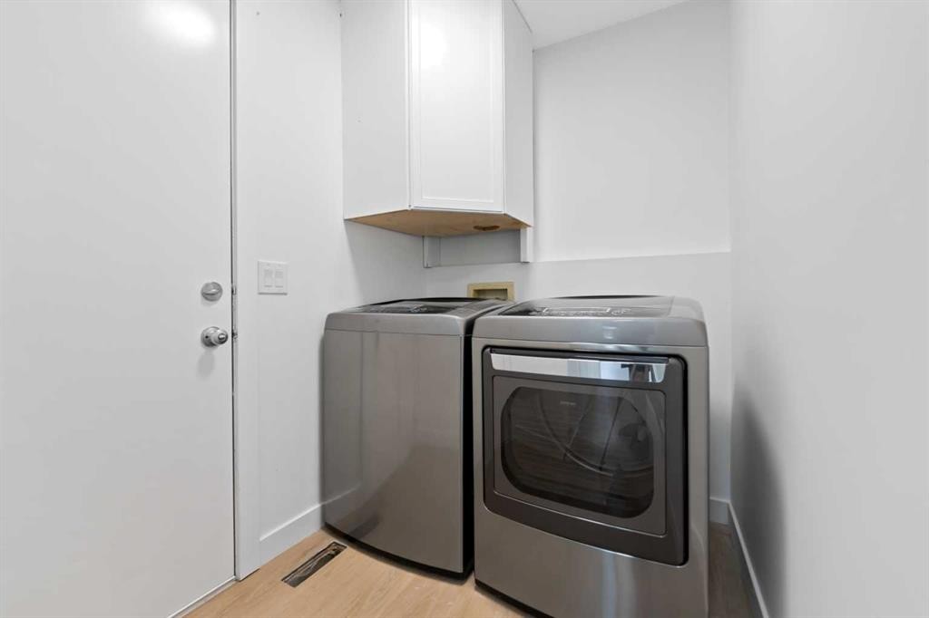 434 Harvest Grove Place Ne, Calgary, AB - Indoor Photo Showing Laundry Room