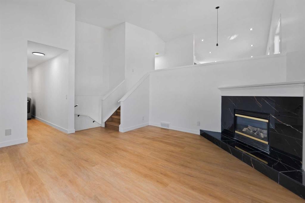 434 Harvest Grove Place Ne, Calgary, AB - Indoor With Fireplace