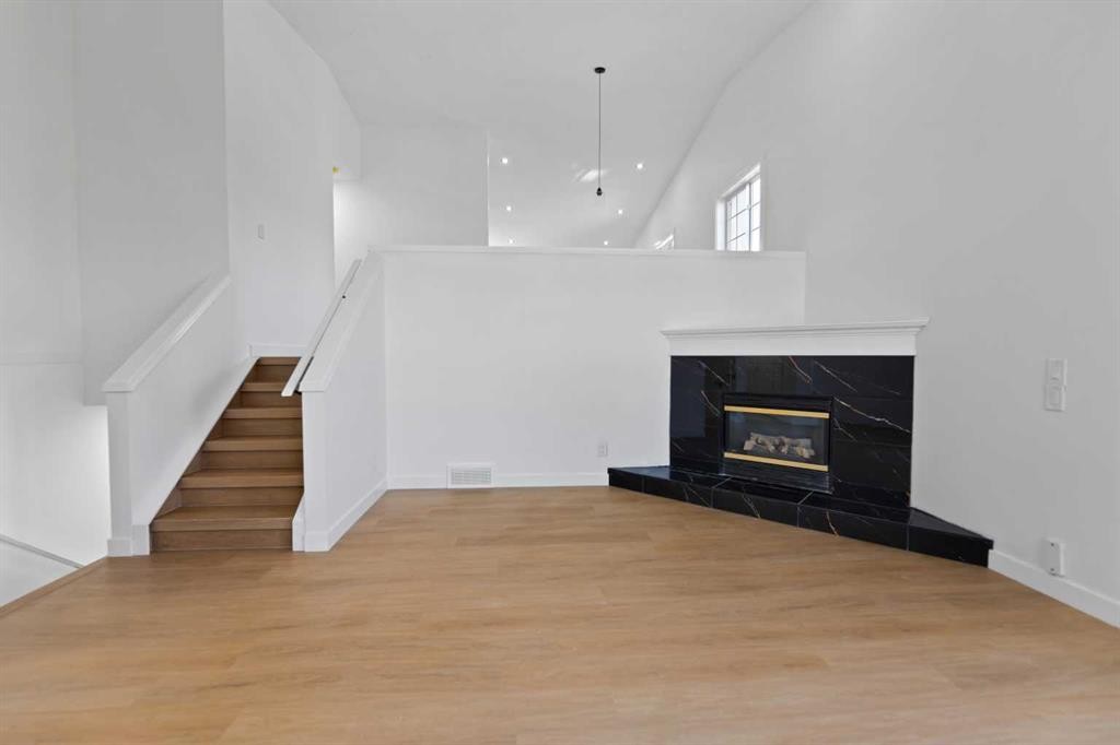 434 Harvest Grove Place Ne, Calgary, AB - Indoor With Fireplace