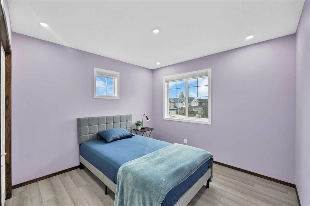 799 New Brighton Drive Se, Calgary, AB - Indoor Photo Showing Bedroom