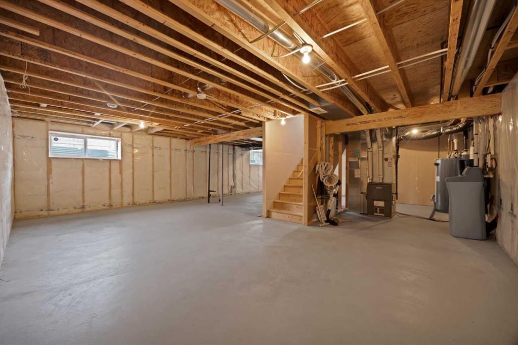 799 New Brighton Drive Se, Calgary, AB - Indoor Photo Showing Basement