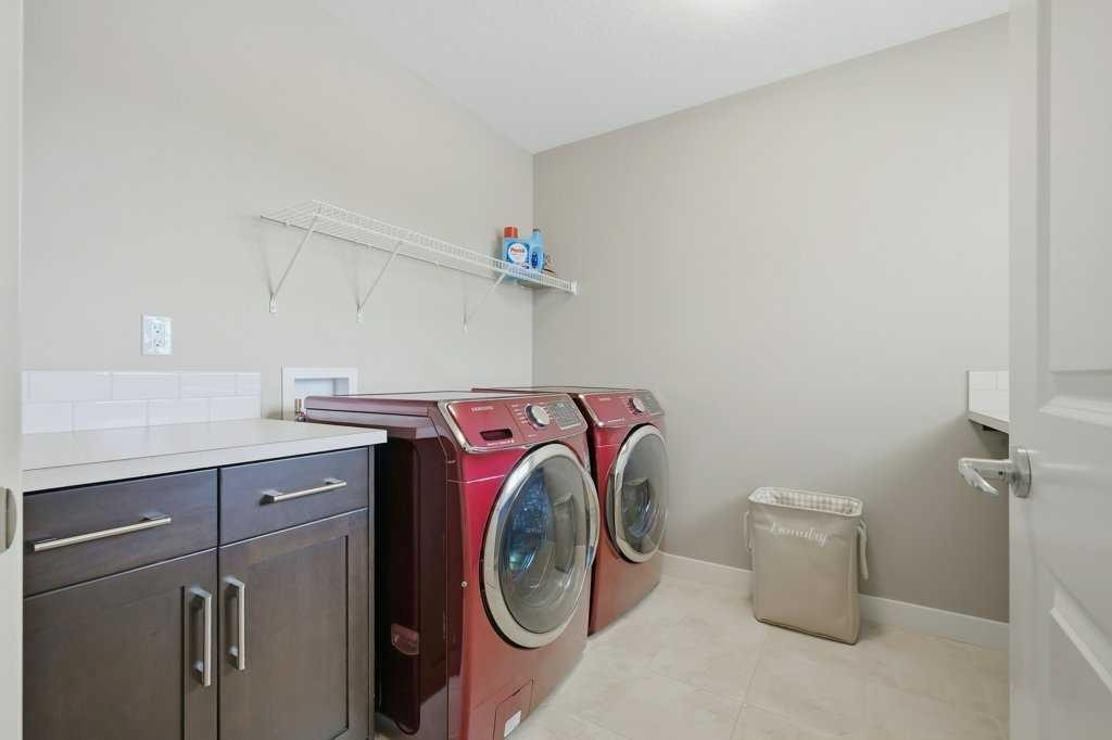 27 Jumping Pound Terrace, Cochrane, AB - Indoor Photo Showing Laundry Room