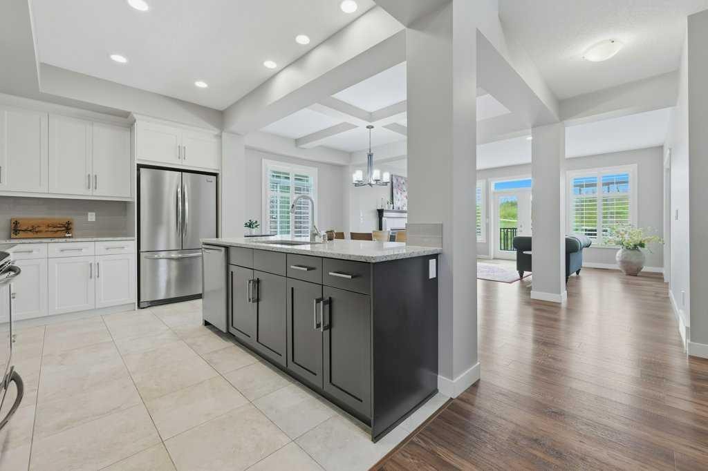 27 Jumping Pound Terrace, Cochrane, AB - Indoor Photo Showing Kitchen With Upgraded Kitchen