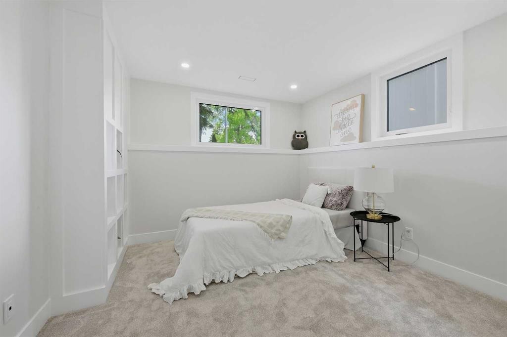 1132 Lake Sylvan Place Se, Calgary, AB - Indoor Photo Showing Bedroom