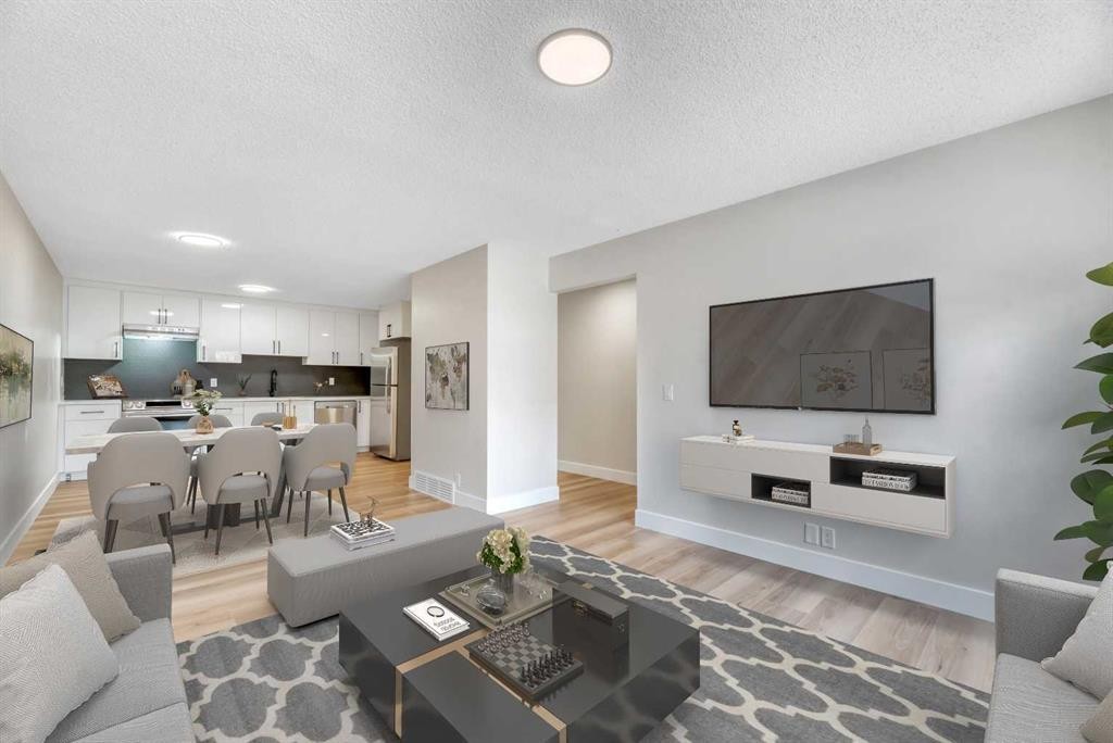 8-75 Templemont Way Ne, Calgary, AB - Indoor Photo Showing Living Room