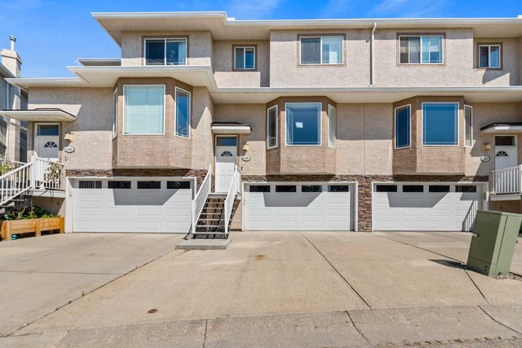 116 Country Hills Gardens Nw, Calgary, AB - Outdoor With Facade