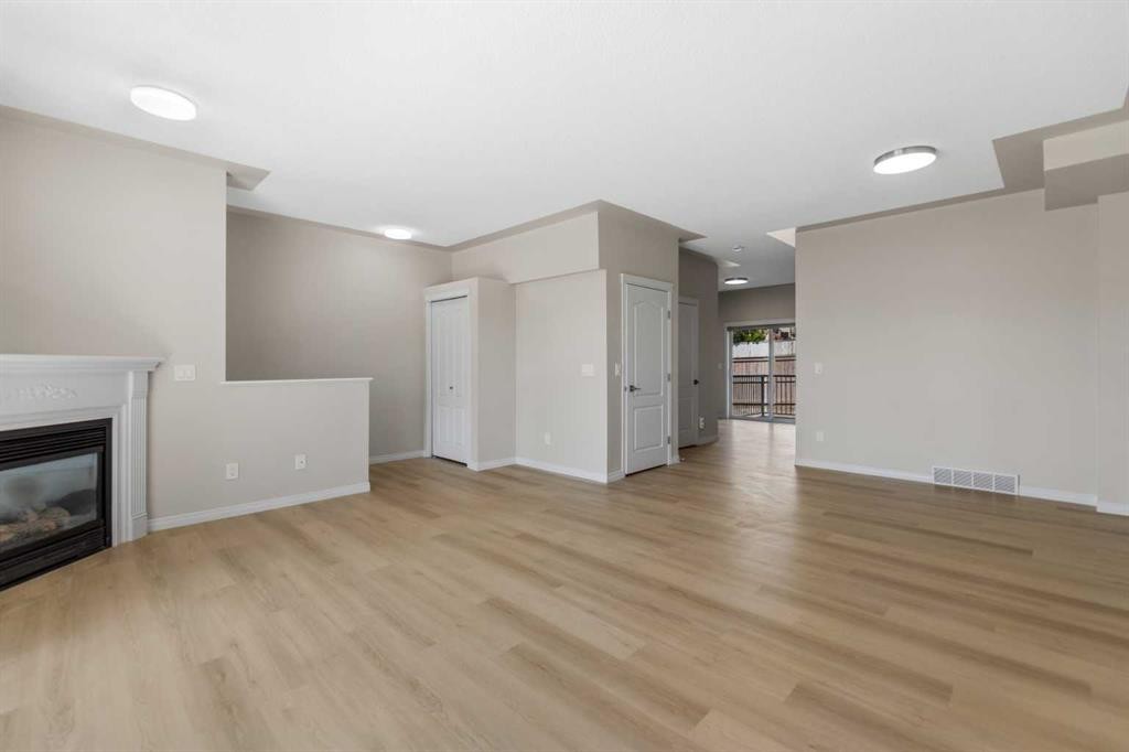 116 Country Hills Gardens Nw, Calgary, AB - Indoor Photo Showing Living Room With Fireplace
