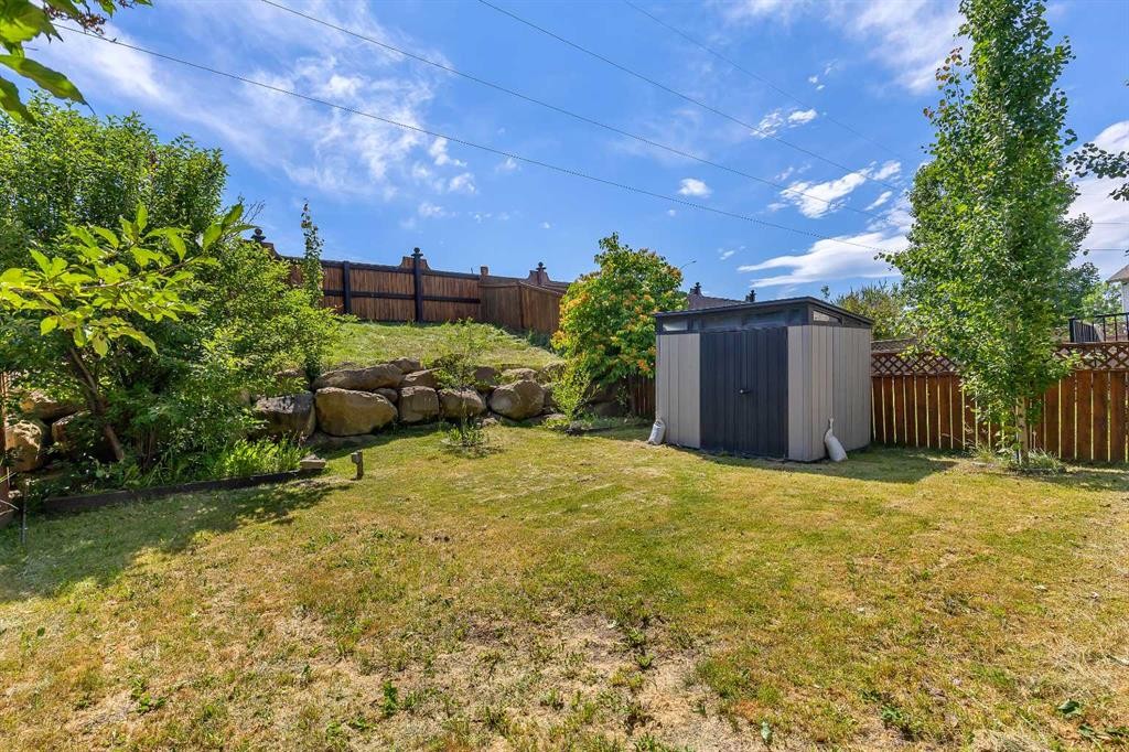 167 Valley Crest Close Nw, Calgary, AB - Outdoor With Backyard