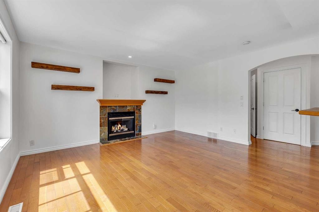167 Valley Crest Close Nw, Calgary, AB - Indoor Photo Showing Living Room With Fireplace