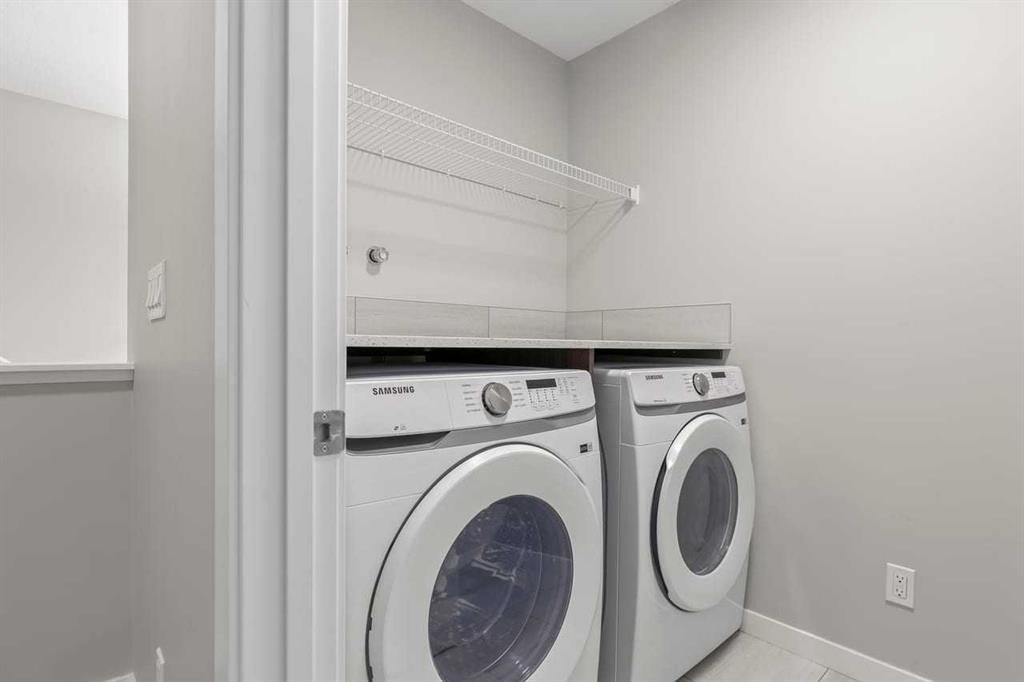 109 Mallard Grove Se, Calgary, AB - Indoor Photo Showing Laundry Room