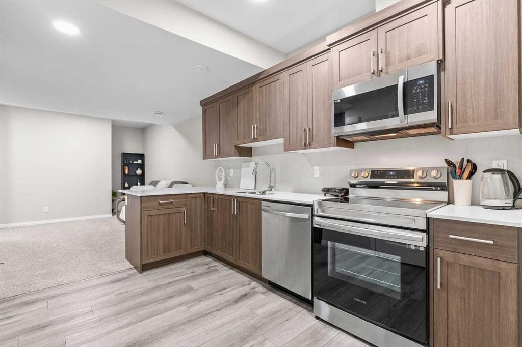 109 Mallard Grove Se, Calgary, AB - Indoor Photo Showing Kitchen With Stainless Steel Kitchen
