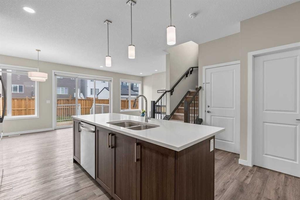 109 Mallard Grove Se, Calgary, AB - Indoor Photo Showing Kitchen With Double Sink