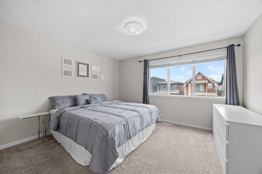 38 Howse Row North, Calgary, AB - Indoor Photo Showing Bedroom