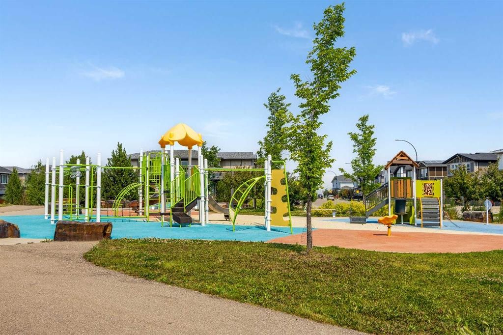 38 Howse Row North, Calgary, AB - Outdoor With In Ground Pool With Backyard