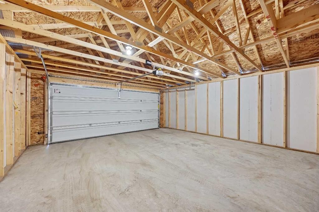38 Howse Row North, Calgary, AB - Indoor Photo Showing Garage